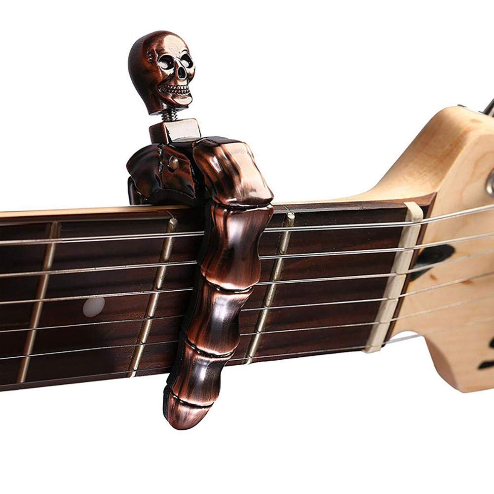 Musical Instruments Easy - คาโป้กีตาร์รูปหัวกะโหลกสำหรับกีตาร์โปร่งและกีตาร์ไฟฟ้า คาโป้รูปหัวกะโหลกสำหรับอูคูเลเล่ แบนโจ แมนโดลิน เบส และกีตาร์คลาสสิก