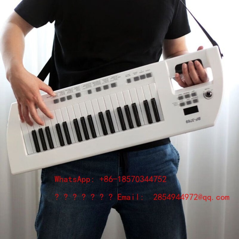Musical Instrument Net - ออร์แกนอิเล็กทรอนิกส์ 37 คีย์ สำหรับผู้สูงอายุ แบบกีตาร์ พร้อมวงล้อหมุน